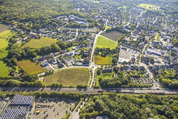 Aerial view, residential area with roundabout Vogelstraße, Frielicker Weg and Ahlener Straße, meadows, in the background the St. Barbara-Klinik, district of Heessen, Hamm, Ruhr area, North Rhine-Westphalia, Germany, DE, Europe, health care, property tax, hospital, real estate, clinic, clinic centre, hospital, roundabout, aerial view, aerial photography, aerial photography, medical facility, medical aid, road traffic, overview, bird's eye view, residential area, housing and living, residential area, quality of life, residential quarter, housing estate, residential area, birds-eyes view, overview, medical care