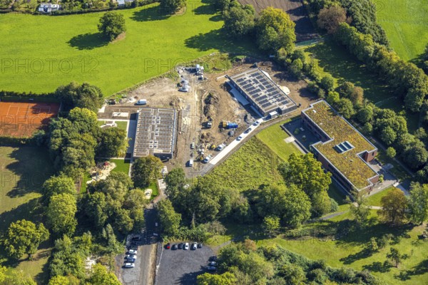 Aerial view, construction site with new day care centre of SVE Heessen, Schlossstraße, district Heessen, Hamm, Ruhr area, North Rhine-Westphalia, Germany, construction work, construction area, building site, building plots, construction measure, construction project, construction site, DE, Europe, kindergarten, day care centre, day care centre, aerial view, aerial photography, aerial photography, new building, overview, bird's eye view, overview