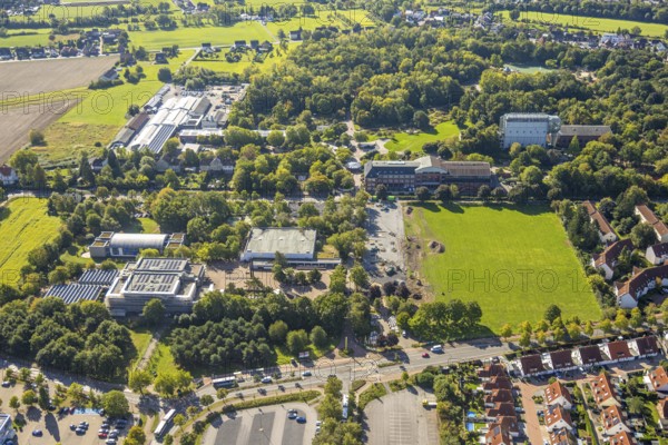 Aerial view, Freiherr-vom-Stein-Gymnasium and construction site, Maximilianpark, Uentrop, Hamm, Ruhr area, North Rhine-Westphalia, Germany, construction work, construction area, building site, building plots, construction measure, construction project, construction site, education, educational institution, DE, Europe, grammar school, teaching institute, aerial view, aerial photography, aerial photography, MaxiPark, new building, school, overview, conversion, bird's eye view, Werner-Figgen-Weg, birds-eyes view, overview