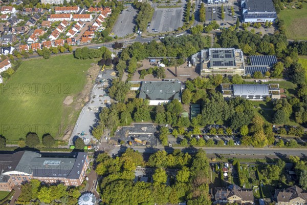 Aerial view, construction site and meadow at Freiherr-vom-Stein-Gymnasium, entrance area Maximilianpark Hamm, Uentrop, Hamm, Ruhr area, North Rhine-Westphalia, Germany, construction work, construction area, construction site, building plots, construction project, construction site, education, educational institution, DE, Europe, grammar school, teaching institute, aerial view, aerial photography, aerial photography, new building, school, overview, conversion, bird's eye view, Werner-Figgen-Weg, birds-eyes view, overview