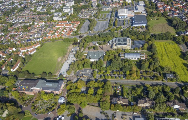 Aerial view, construction site and meadow at Freiherr-vom-Stein-Gymnasium, entrance area Maximilianpark Hamm, Uentrop, Hamm, Ruhr area, North Rhine-Westphalia, Germany, construction work, construction area, construction site, building plots, construction project, construction site, education, educational institution, DE, Europe, grammar school, teaching institute, aerial view, aerial photography, aerial photography, new building, school, overview, conversion, bird's eye view, Werner-Figgen-Weg, birds-eyes view, overview