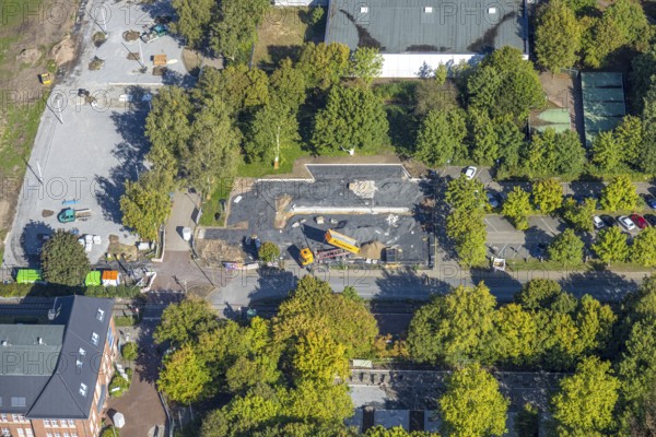 Aerial view, construction site and meadow at Freiherr-vom-Stein-Gymnasium, entrance area Maximilianpark Hamm, Uentrop, Hamm, Ruhr area, North Rhine-Westphalia, Germany, construction work, construction area, construction site, building plots, construction project, construction site, education, educational institution, DE, Europe, grammar school, teaching institute, aerial view, aerial photography, aerial photography, new building, school, overview, conversion, bird's eye view, Werner-Figgen-Weg, birds-eyes view, overview