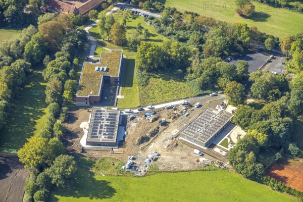 Aerial view, construction site with new day care centre of SVE Heessen, Schlossstraße, district Heessen, Hamm, Ruhr area, North Rhine-Westphalia, Germany, construction work, construction area, building site, building plots, construction measure, construction project, construction site, DE, Europe, kindergarten, day care centre, day care centre, aerial view, aerial photography, aerial photography, new building, overview, bird's eye view, overview