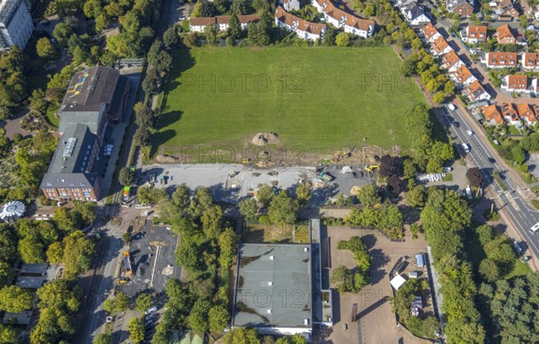 Aerial view, construction site and meadow at Freiherr-vom-Stein-Gymnasium, Uentrop, Hamm, Ruhr area, North Rhine-Westphalia, Germany, construction work, construction area, building site, building plots, construction measure, construction project, construction site, education, educational institution, DE, Europe, grammar school, teaching institute, aerial view, aerial photography, aerial photography, new building, school, overview, conversion, bird's eye view, Werner-Figgen-Weg, birds-eyes view, overview