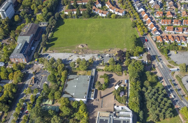 Aerial view, construction site and meadow at Freiherr-vom-Stein-Gymnasium, Uentrop, Hamm, Ruhr area, North Rhine-Westphalia, Germany, construction work, construction area, building site, building plots, construction measure, construction project, construction site, education, educational institution, DE, Europe, grammar school, teaching institute, aerial view, aerial photography, aerial photography, school, overview, reconstruction, bird's eye view, Werner-Figgen-Weg, birds-eyes view, overview