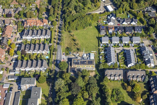 Aerial view, construction site with new building day care centre Villa Kunterbunt at Ostwennemarstraße corner Alter Uentroper Weg, terraced house housing estate, Uentrop, Hamm, Ruhr area, North Rhine-Westphalia, Germany, construction work, construction area, construction site, building plots, construction crane, construction project, construction site, DE, Europe, kindergarten, day care centre, day care centre, aerial view, aerial photography, aerial photography, new building, overview, bird's-eye view, overview