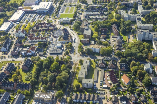 Aerial view, residential area road traffic intersection Ostwennemarstraße and Alter Uentroper Weg, shopping centre with Rewe supermarket, wooded area with Villa Kunterbunt, Uentrop, Hamm, Ruhr area, North Rhine-Westphalia, Germany, DE, Europe, kindergarten, day-care centre, nursery, aerial view, aerial photography, aerial photography, road intersection, road traffic, overview, bird's-eye view, overview