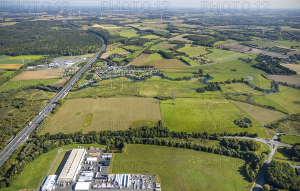 Aerial view, river Lippe river meander meadow landscape Schmehauser Mersch, motorway A2, meadows and fields, Autohof Lippetal and campsite Uentrop Helbach - Lippetal, Uentrop, Hamm, Ruhr area, North Rhine-Westphalia, Germany, agriculture, camping, camping site, campsite, DE, Europe, agricultural fields, aerial view, aerial photography, aerial photography, overview, bird's-eye view, meadows, birds-eyes view, overview