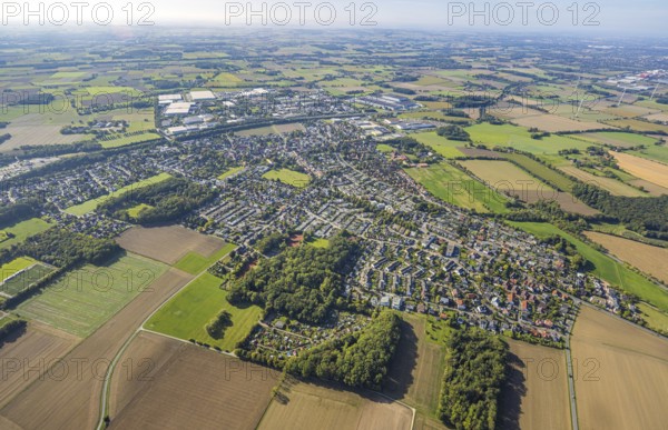 Aerial view, residential area, view of Rhynern district, behind the commercial area Oberster Kamp, Rhynern district, Hamm, Ruhr area, North Rhine-Westphalia, Germany, DE, Europe, commercial enterprise, commercial area, commercial area, commercial property, commercial location, commercial use, property tax, real estate, industrial area, industrial location, aerial view, aerial photography, aerial photography, overview, bird's-eye view, residential area, housing and living, residential area, residential quality, residential neighbourhood, housing estate, residential district, birds-eyes view, overview