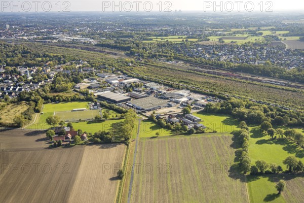 Aerial view, Hamm marshalling yard, Schieferstraße industrial estate, meadows and fields at Wiescher Bach, Pelkum district, Hamm, Ruhr area, North Rhine-Westphalia, Germany, railway area, DE, Deutsche Bahn AG, Europe, commercial enterprise, commercial area, commercial property, commercial site, commercial use, railway tracks, tracks, property tax, goods trains, real estate, industrial area, industrial site, aerial view, aerial photography, aerial photography, overview, bird's-eye view, residential area, housing and living, residential area, residential quality, residential neighbourhood, housing estate, residential district, birds-eyes view, overview