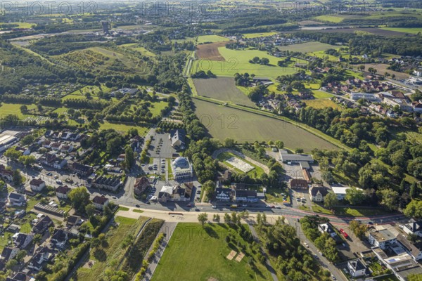 Aerial view, DitiB Ulu Camii Mosque next to the Barbara Stadium, Herringer Bach, behind the CreativRevier with Hammerkopfturm and slag heap Humbert, district Herringen, Hamm, Ruhr area, North Rhine-Westphalia, Germany, place of worship, slag heap, CreativRevier Heinrich Robert, DE, Europe, religious community, place of worship, slag heap, sacred site, church, parish, denomination, aerial view, aerial photography, aerial photography, religion, religious site, sports facility, sports field, stadium, overview, bird's-eye view, overview