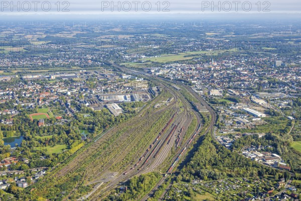 Aerial view, Hamm marshalling yard, view to the city and to the main station, commercial area Östingstraße, district Pelkum, Hamm, Ruhr area, North Rhine-Westphalia, Germany, railway area, railway station, DE, Deutsche Bahn AG, Europe, commercial enterprise, commercial area, commercial property, commercial location, commercial use, railway tracks, tracks, property tax, goods trains, main station, main railway station, real estate, industrial area, industrial location, aerial view, aerial photography, aerial photography, overview, bird's-eye view, residential area, residential area, residential quality, residential neighbourhood, residential estate, residential district, birds-eyes view, overview