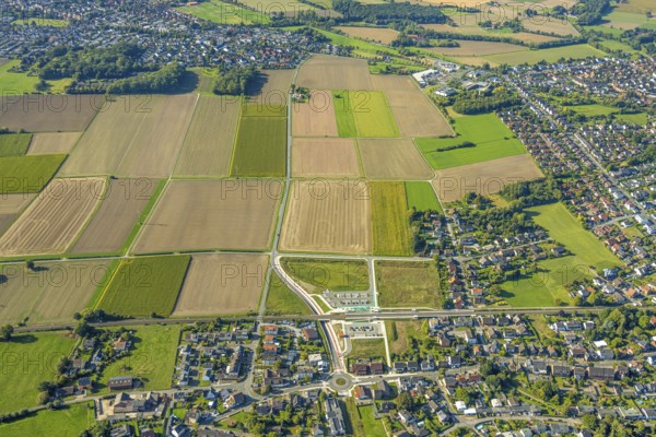 Aerial view, planned stop in Westtünnen, construction site at Südfeldweg and Von-Thünen-Straße for the future railway stop, meadows and fields at Südfeldweg, Rhynern district, Hamm, Ruhr area, North Rhine-Westphalia, Germany, railway tracks, railway station, construction work, construction area, construction site, building plots, construction crane, construction project, construction project, construction site, DE, Deutsche Bahn AG, Europe, large construction site, aerial view, aerial photography, aerial photography, new construction, road tunnel, tunnel, overview, subway, bird's-eye view, overview