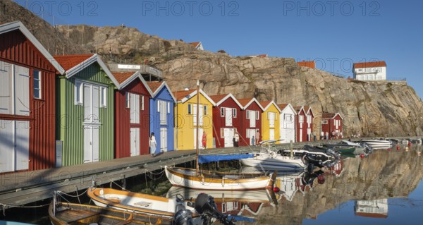 Boats and colourful boathouses in the harbour of Smögen, Smögenbryggan, Västra Götalands Län, Bohuslän, Sweden