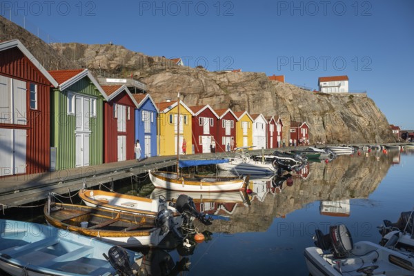 Boats and colourful boathouses in the harbour of Smögen, Smögenbryggan, Västra Götalands Län, Bohuslän, Sweden