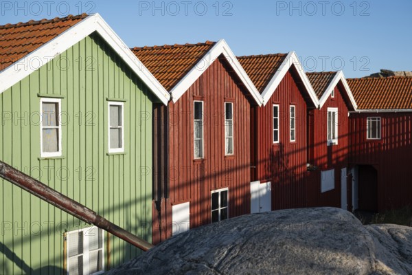 Colourful boathouses in the harbour of Smögen, Smögenbryggan, Västra Götalands Län, Bohuslän, Sweden