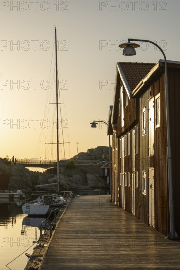 Boats and boathouses in the harbour of Smögen, Smögenbryggan, Västra Götalands Län, Bohuslän, Sweden