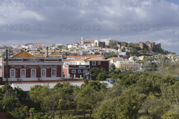 Cityscape with cathedral and Castelo dos Mouros castle, Silves, Algarve, Portugal
