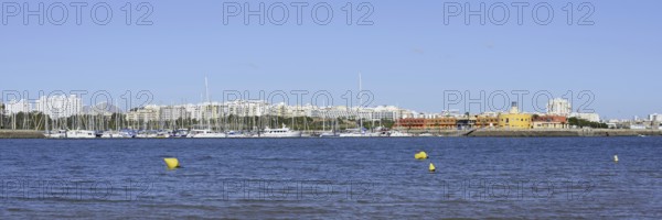 View from Ferragudo to Portimao with marina, Algarve, Portugal