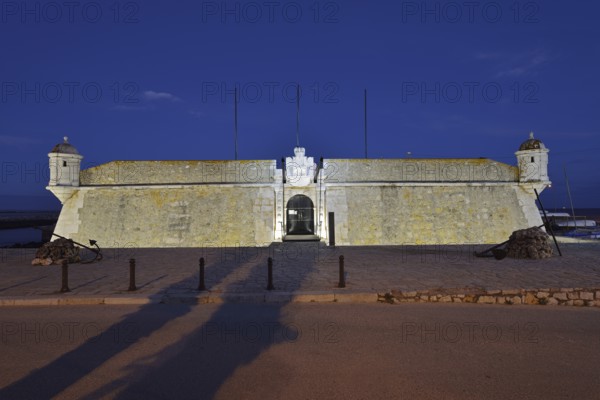 Forte da Ponta da Bandeira fortress by night, Lagos, Algarve, Portugal