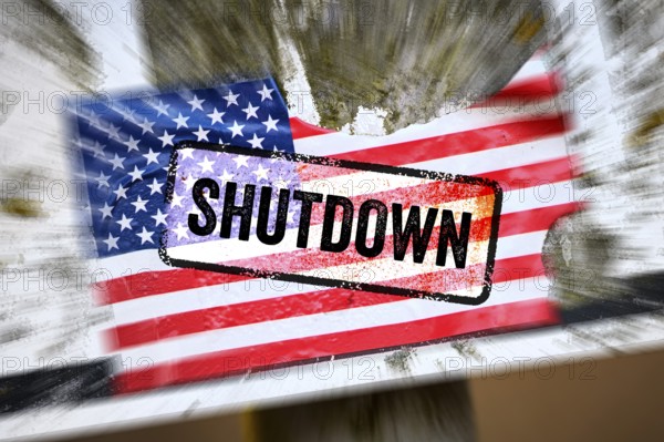 Torn sticker of US flag with shutdown printed on it, photomontage