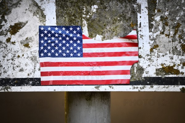 Torn sticker from US flag