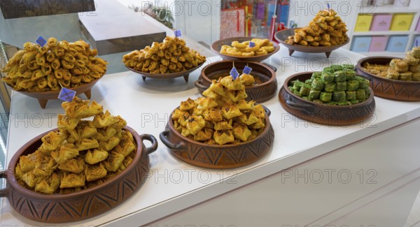 Traditional sweets arranged in decorative bowls in a display, Gntunik supermarket, Aragazotn province, Armenia
