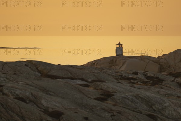 Small lighthouse at sunset, archipelago, Smögen, Smögenbryggan, Västra Götalands Län, Bohuslän, Sweden