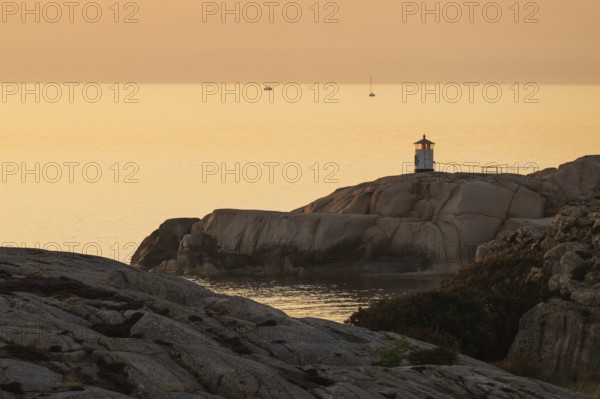 Small lighthouse at sunset, archipelago, Smögen, Smögenbryggan, Västra Götalands Län, Bohuslän, Sweden