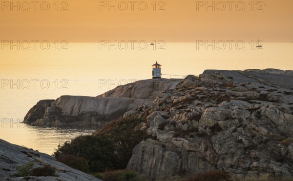 Small lighthouse at sunset, archipelago, Smögen, Smögenbryggan, Västra Götalands Län, Bohuslän, Sweden