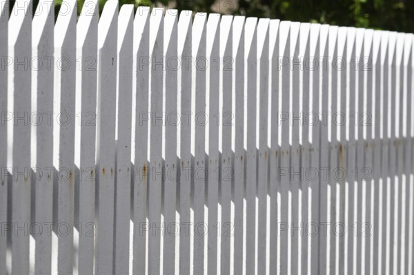 White picket fence, play of light and shadow, Fjällbacka, Bohuslän, West Sweden, Sweden