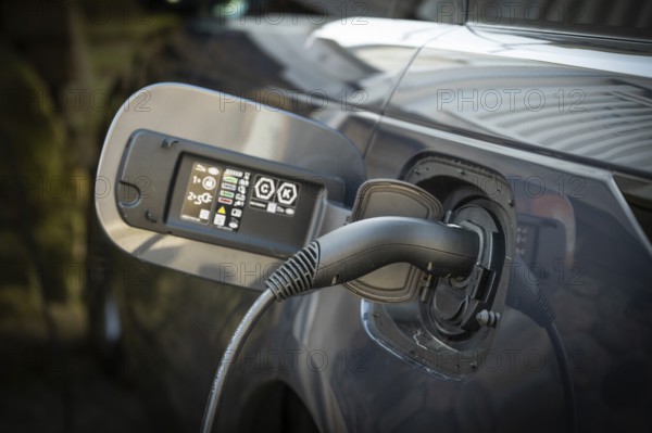 Close-up of an electric car charging point with cable, Fjällbacka, Bohuslän, western Sweden, Sweden