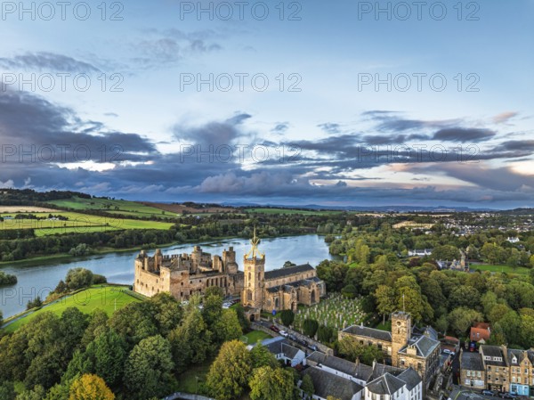 Sunset over Linlithgow Palace from a drone, Linlithgow Loch, West Lothian, Scotland, United Kingdom