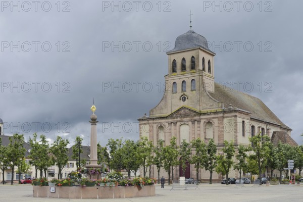 Church of St Louis and fountain on Place d'Armes-General-de-Gaulle, Neuf-Brisach, Haut-Rhin department, Alsace, France