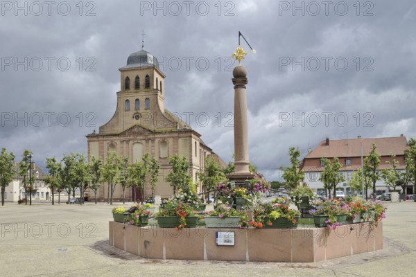 Church of St Louis and fountain on Place d'Armes-General-de-Gaulle, Neuf-Brisach, Haut-Rhin department, Alsace, France