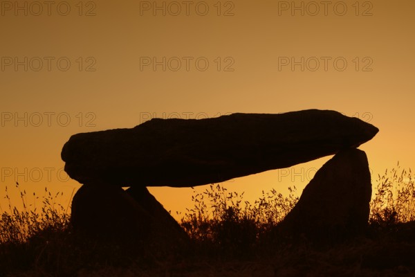 Dolmen at sunset, Finistere department, Brittany, France