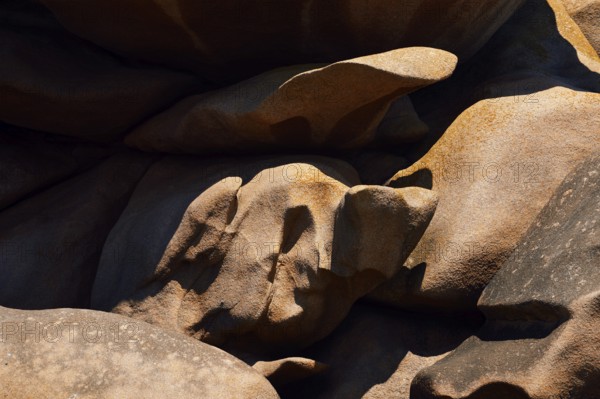 Granite rocks on the Cote de Granit Rose coast near Ploumanac'h, Cotes-d'Armor, Brittany, France