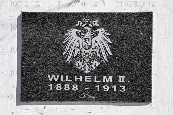 Memorial plaque on the monument to Kaiser Wilhelm II at the railway station in Aus, Karas Region, Namibia