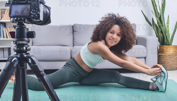 A young woman is stretching on a mat in front of a camera. The camera is on a tripod and is recording her workout. Scene is energetic and focused on fitness, AI generated
