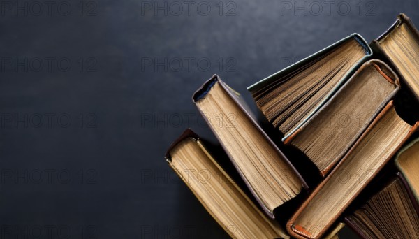 Old books arranged highlighting their historical significance. Neatly arranged representing a collection of wisdom, AI generated