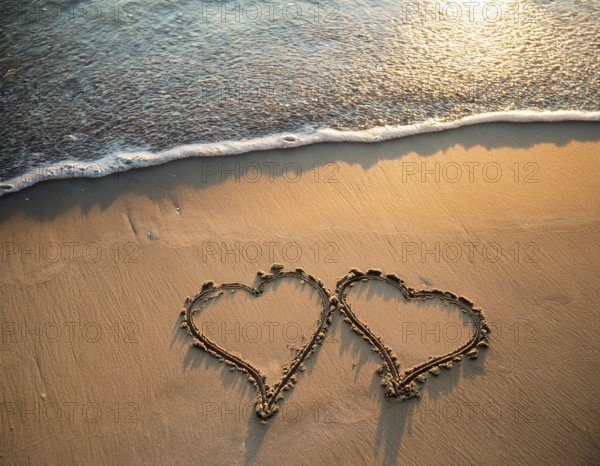 Warm tropical beach with two hearts drawn on the sand, blue waters, and clear skies, invoking feelings of love, romance, serenity, and vacations, perfect for expressing heartfelt and relaxing concepts, AI generated
