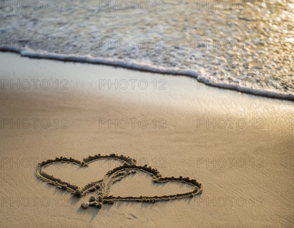 Warm tropical beach with two hearts drawn on the sand, blue waters, and clear skies, invoking feelings of love, romance, serenity, and vacations, perfect for expressing heartfelt and relaxing concepts, AI generated