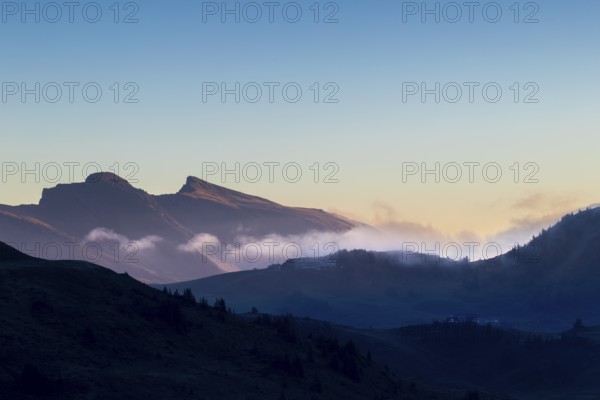 View from Furkajoch a mountain range above a sea of fog, dawn, dawn, autumn, Vorarlberg, Austria