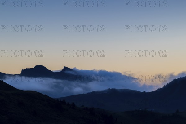 View from Furkajoch a mountain range above a sea of fog, dawn, dawn, autumn, Vorarlberg, Austria