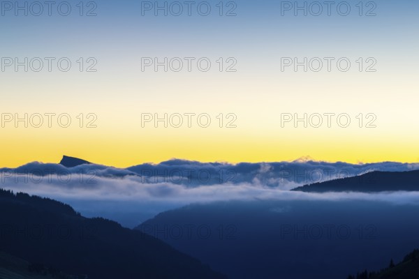 View from Furkajoch to Hoher Ifen, mountain range above sea of fog, dawn, dawn, autumn, Vorarlberg, Austria