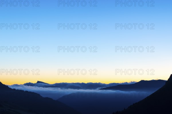 View from Furkajoch to Hoher Ifen, mountain range above sea of fog, dawn, dawn, autumn, Vorarlberg, Austria