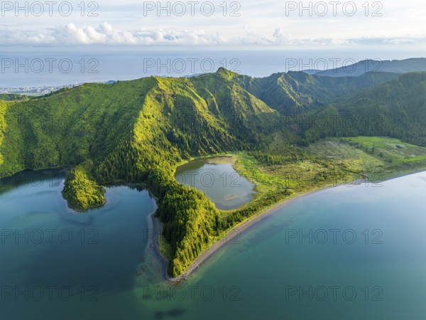 Lagoa do Fogo Lake on Sunny Morning. Green Lush Hills and Mountains. Azores, Sao Miguel Island. Portugal. Aerial View