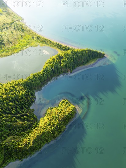 Lagoa do Fogo Lake at Sunrise. Green Lush Hills and Forest. Azores, Sao Miguel Island. Portugal. Aerial Overhead High Angle Shot