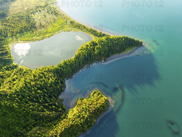 Lagoa do Fogo Lake on Sunny Morning. Green Lush Hills and Forest. Azores, Sao Miguel Island. Portugal. Aerial Overhead High Angle Shot