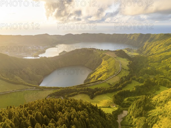 Sete Cidades Caldera on Sunny Evening. Blue Lake and Santiago Lake. Forest and Hills with Pasturelands. Azores, Sao Miguel Island. Portugal. Aerial View